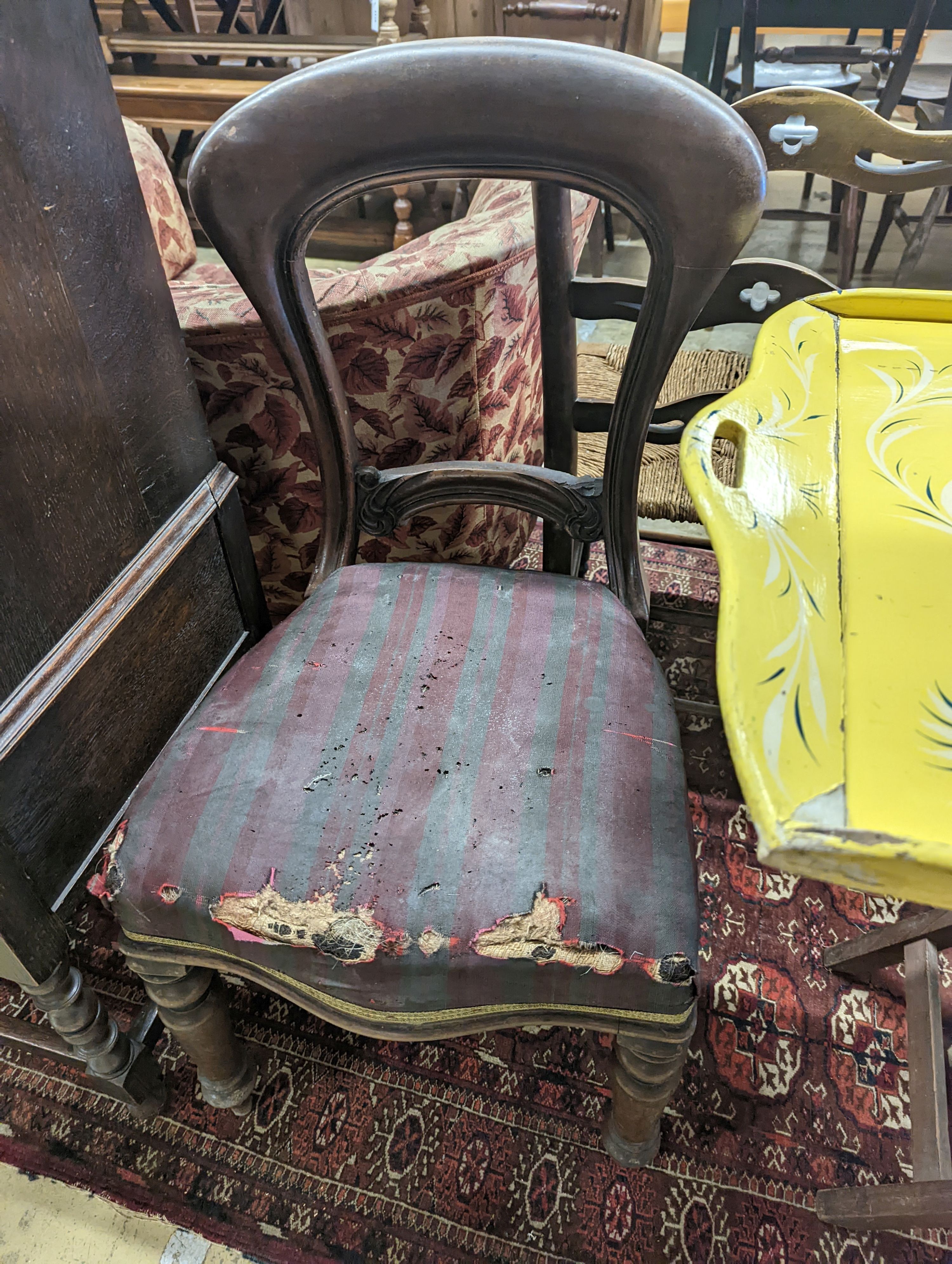 An early 19th century mahogany tripod wine table, two provincial rush seat chairs and one other and a butler's tray